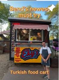 Eky's food cart and owner photo